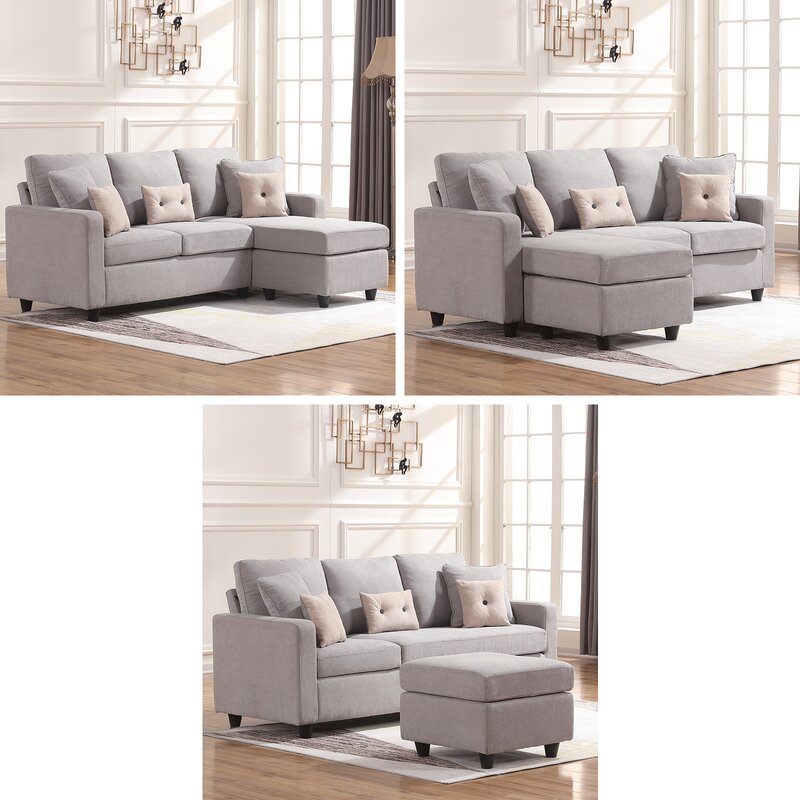 Ottoman serving as a flexible footrest or extra seating next to the chaise lounge.