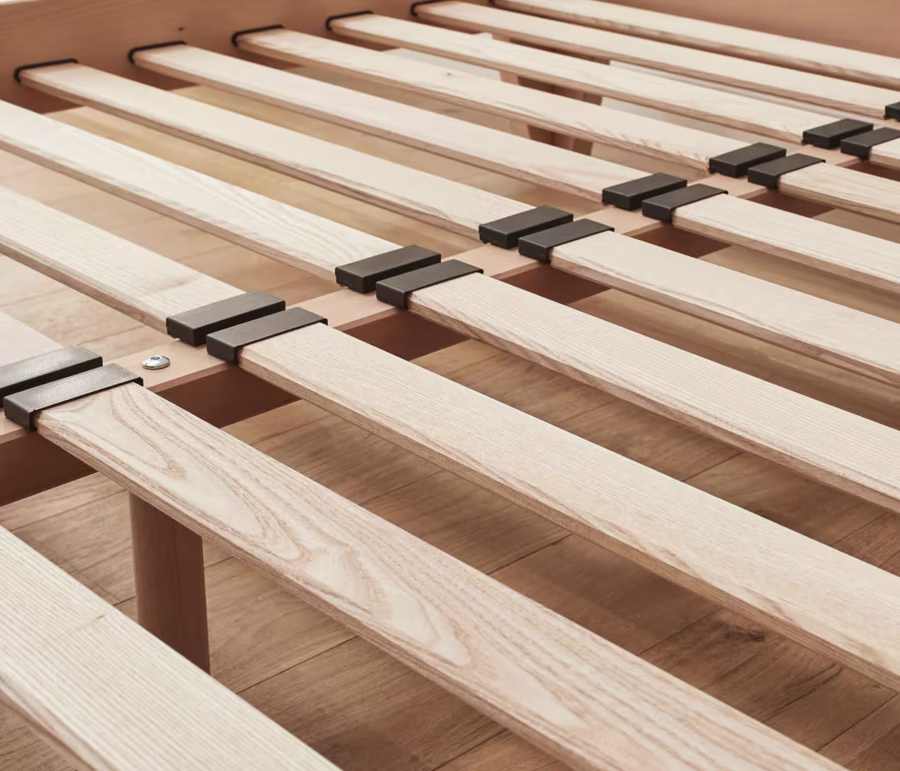 Bed base with natural non-toxic varnish and slatted headboard