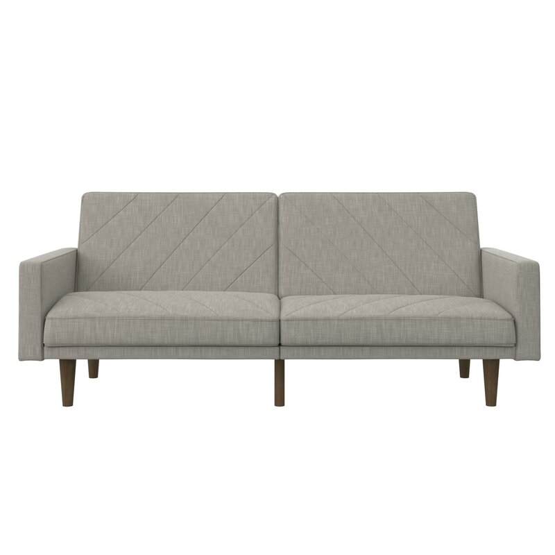 Wide upholstered sofa with adjustable back sections and chaise lounge functionality.