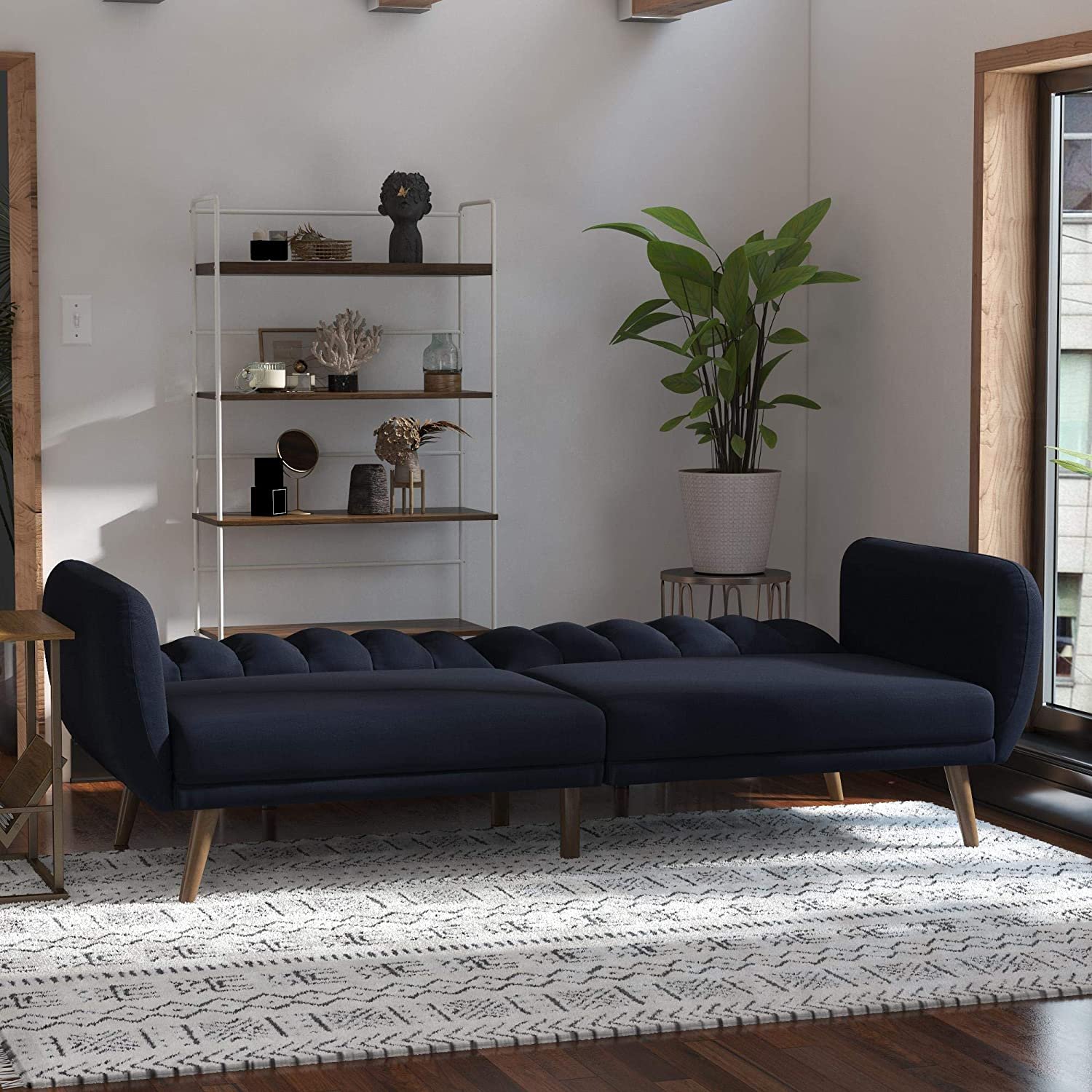 Multi-functional couch for lounging and sleeping.