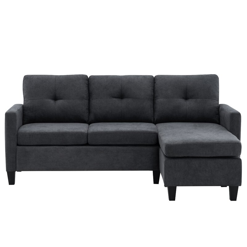Reversible modular sofa set with chaise and ottoman in a spacious living room