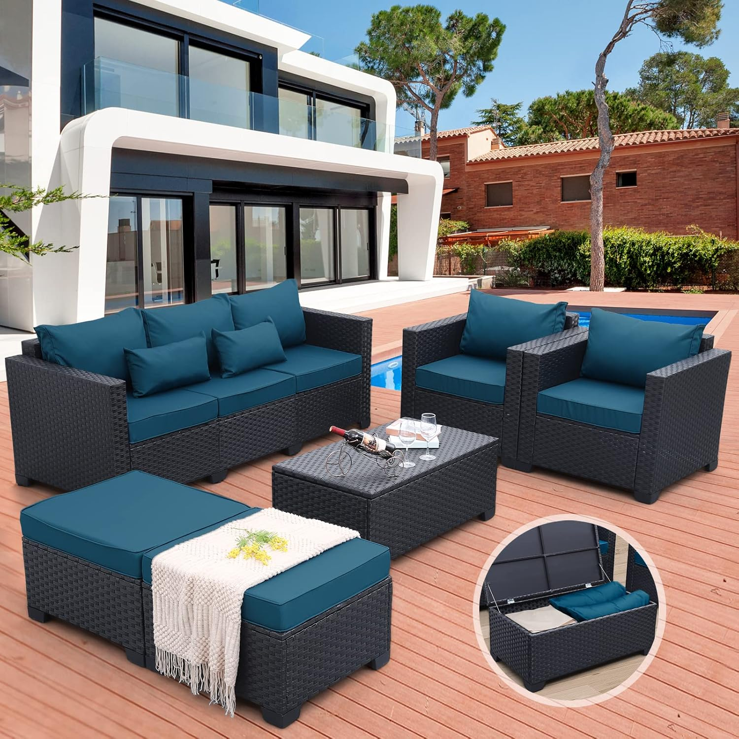 Peacock blue outdoor sofa and chair set arranged on a patio