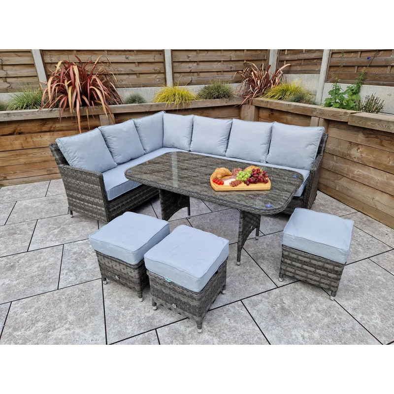 All-weather rattan sofa set arranged for outdoor entertaining