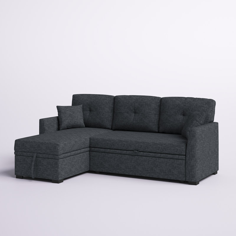The sleeper sofa with the bed pulled out, showing the comfortable mattress.