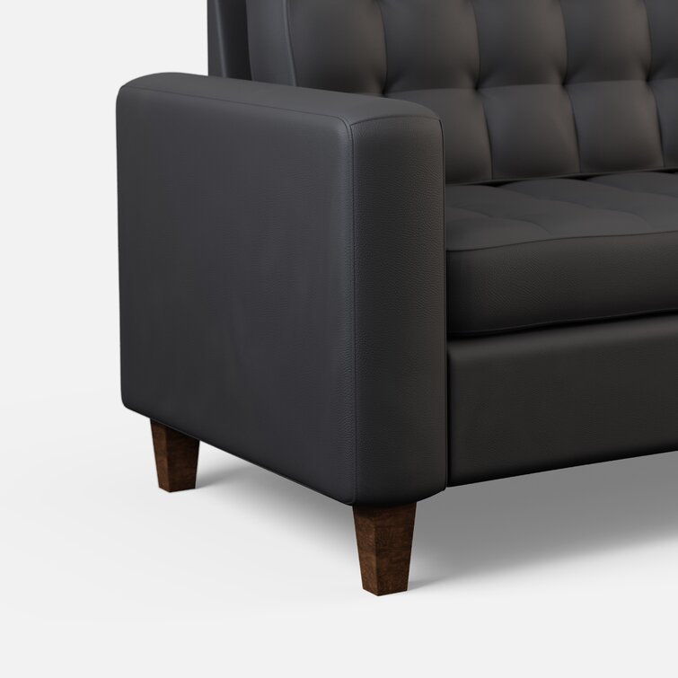 Modern living room sofa with clean lines and square arms