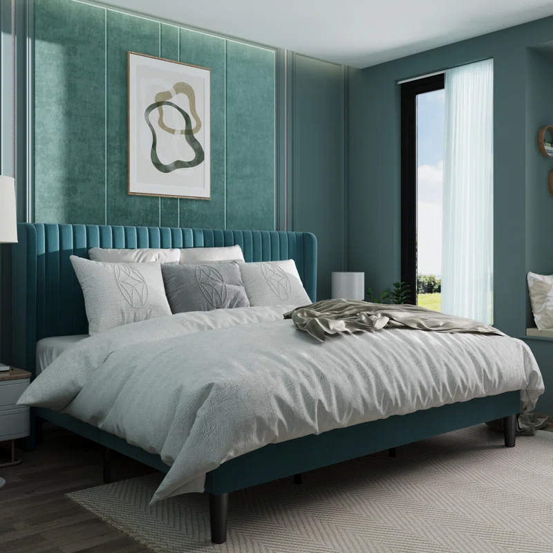 Modern wingback style bed frame for a master bedroom.