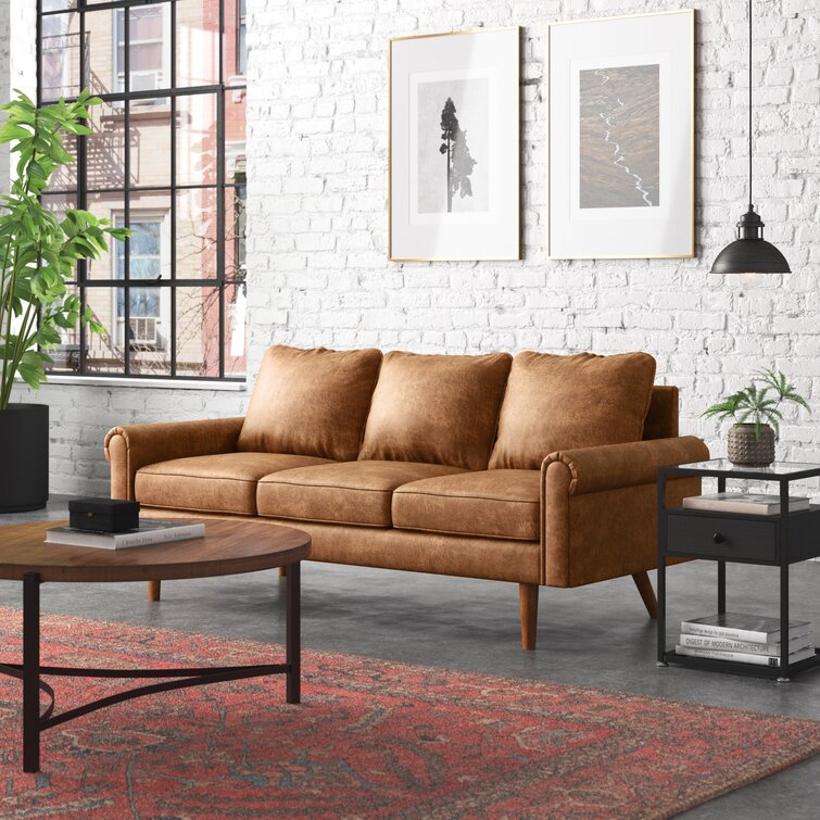 Neutral colored sofa perfect for traditional or transitional style living spaces.