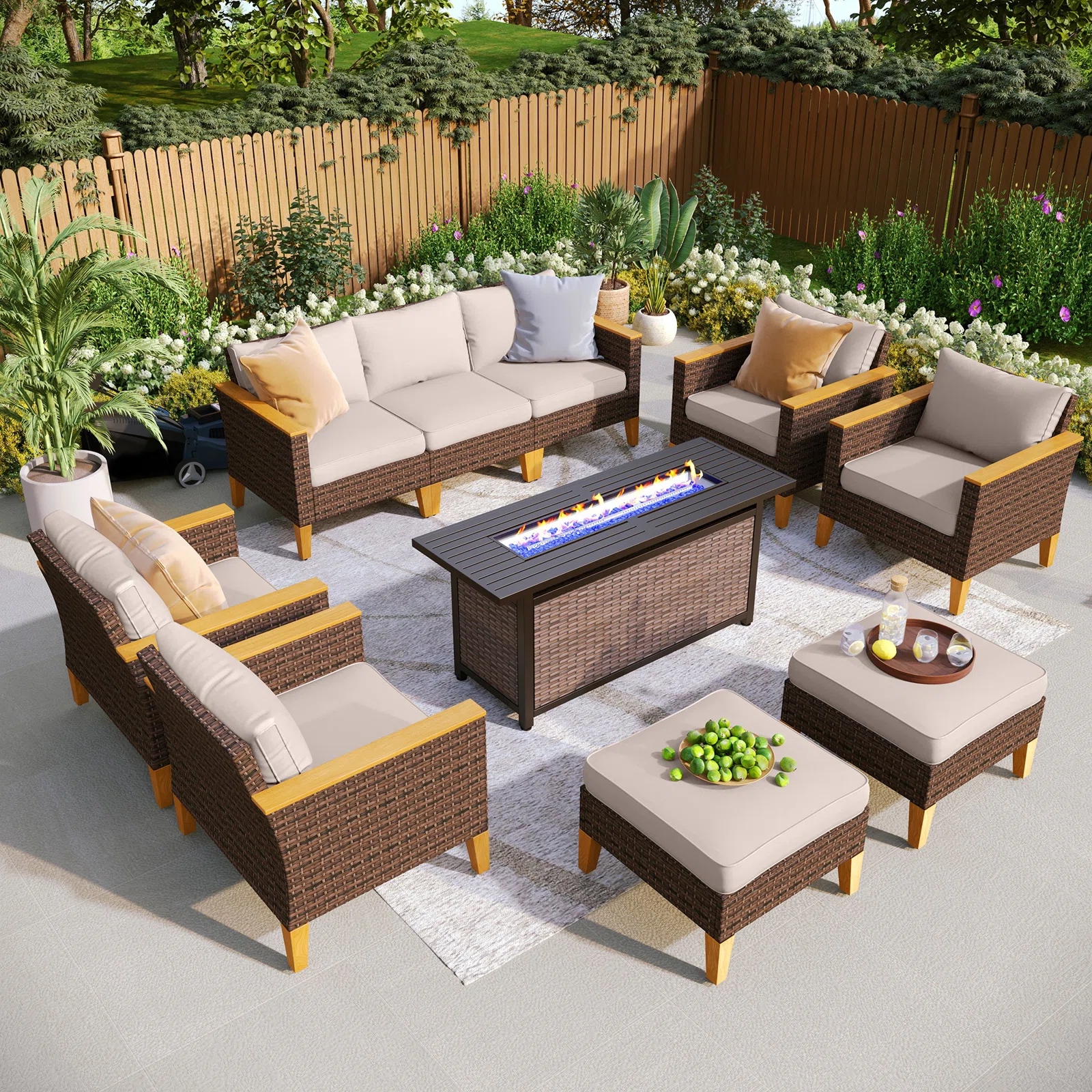 A spacious nine-person wicker patio lounge set arranged on a deck.