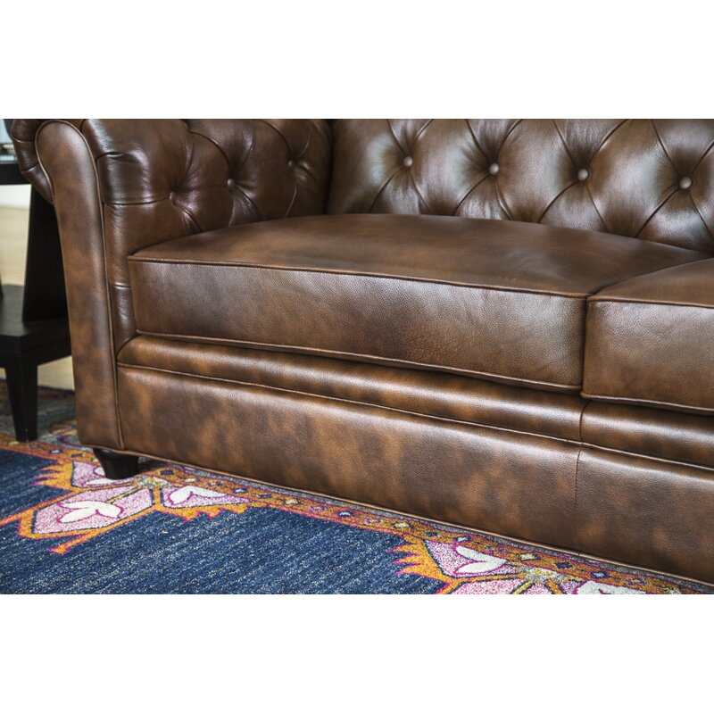 Wide shot of the Chesterfield sofa in a formal living room setting