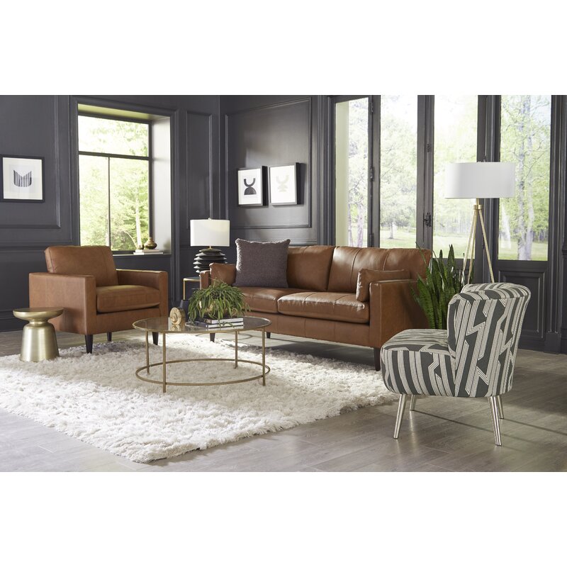 A genuine leather sofa with square arms in a living room setting.