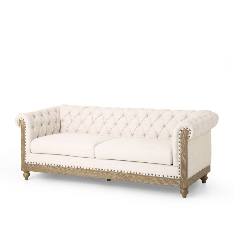 Classic tufted leather sofa in a deep brown finish