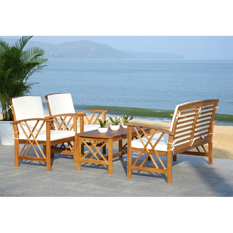 Outdoor wicker lounge set with cushions for four people