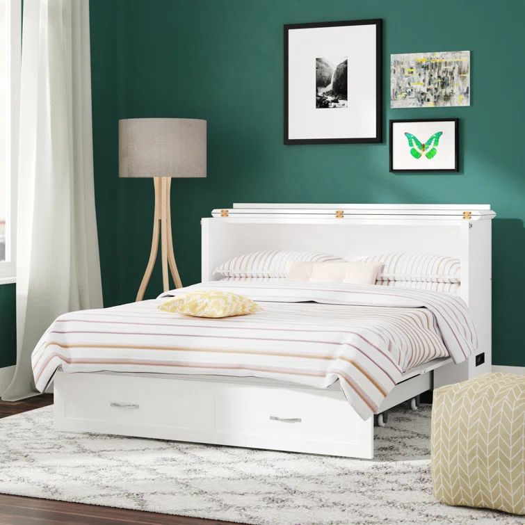 A white space-saving Murphy bed folded up into a stylish storage chest.