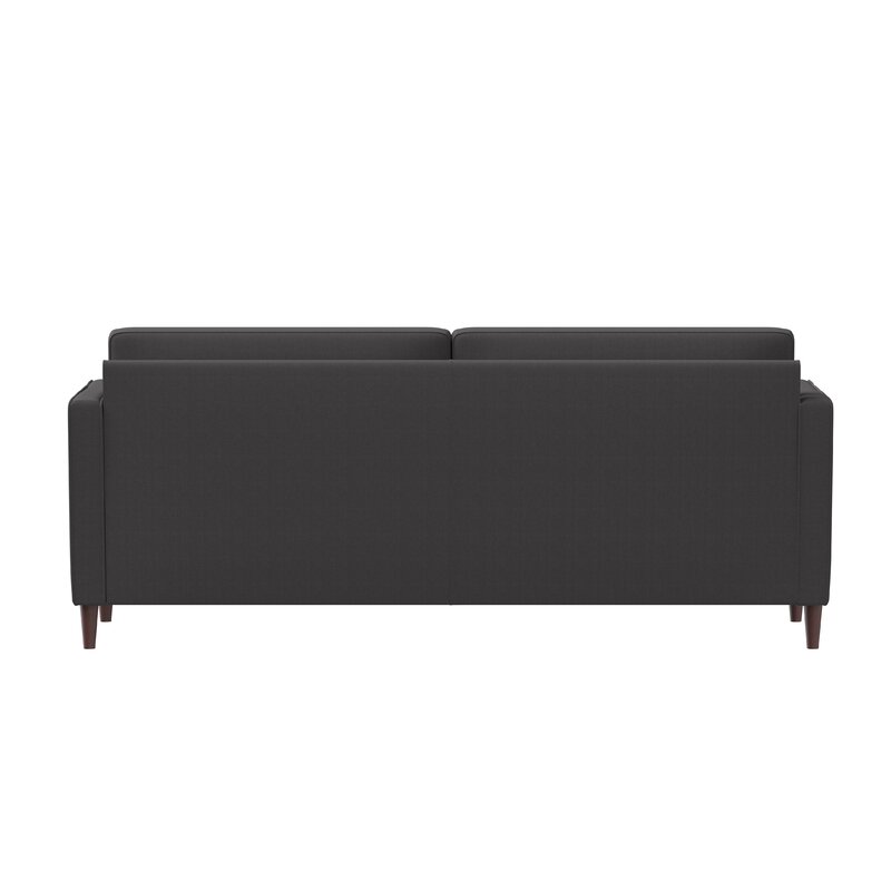 Stylish grey square arm sectional sofa in a contemporary lounge.