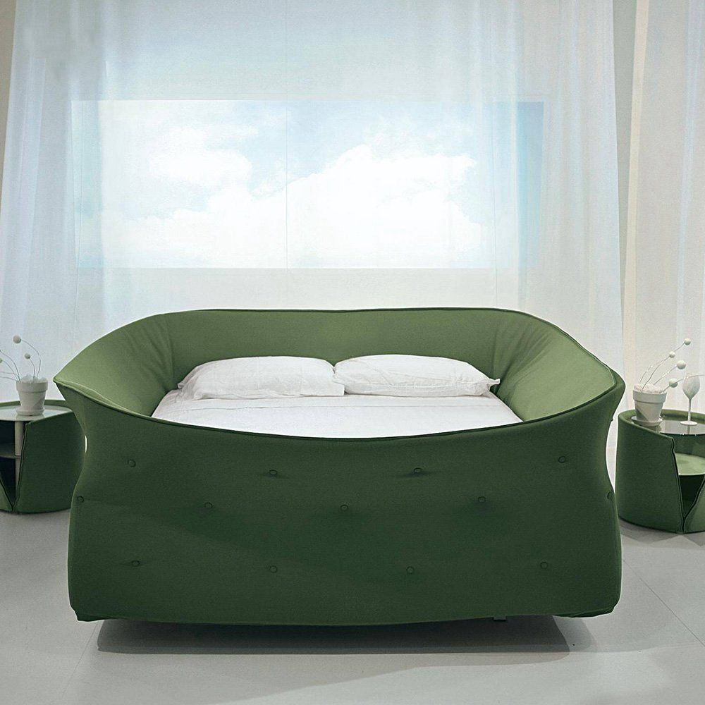 Modern double bed with a unique woven bird nest style headboard in a master bedroom.