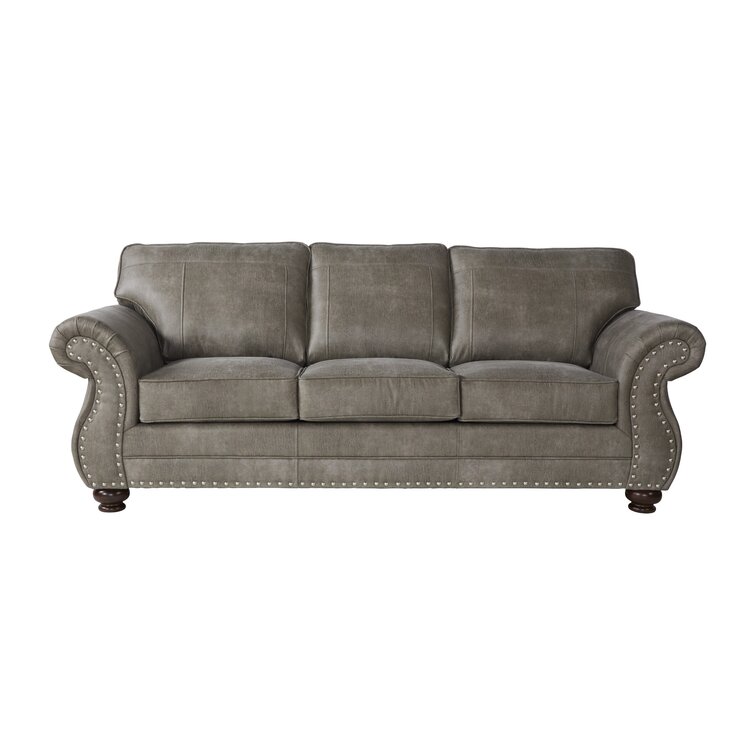 Comfortable loveseat with plush seat and back cushions