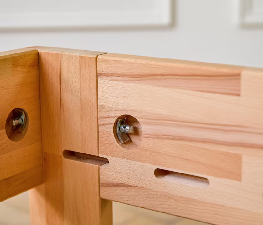 Bed frame with central support leg