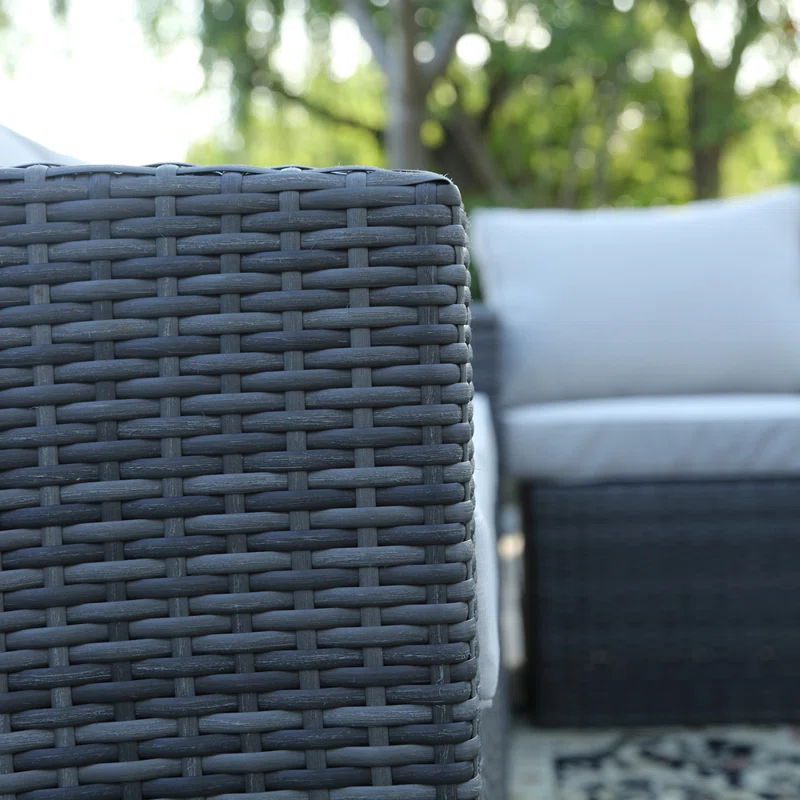 Outdoor wicker patio lounge set with cushions for eight people