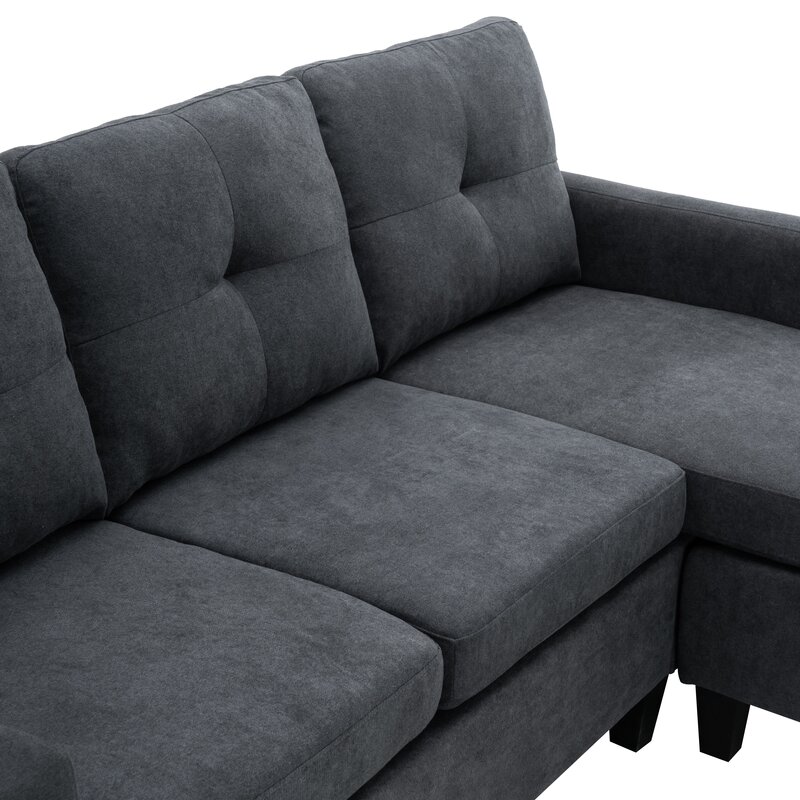 Reversible chaise lounge component shown in its left-facing position