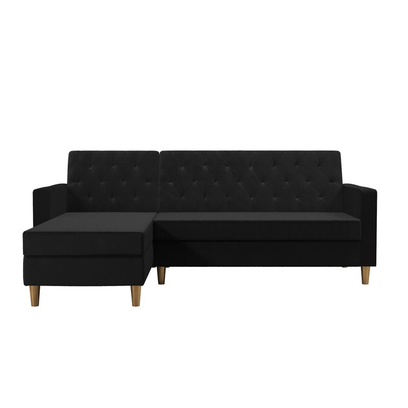 Sleeper sofa chaise shown in a cozy studio apartment