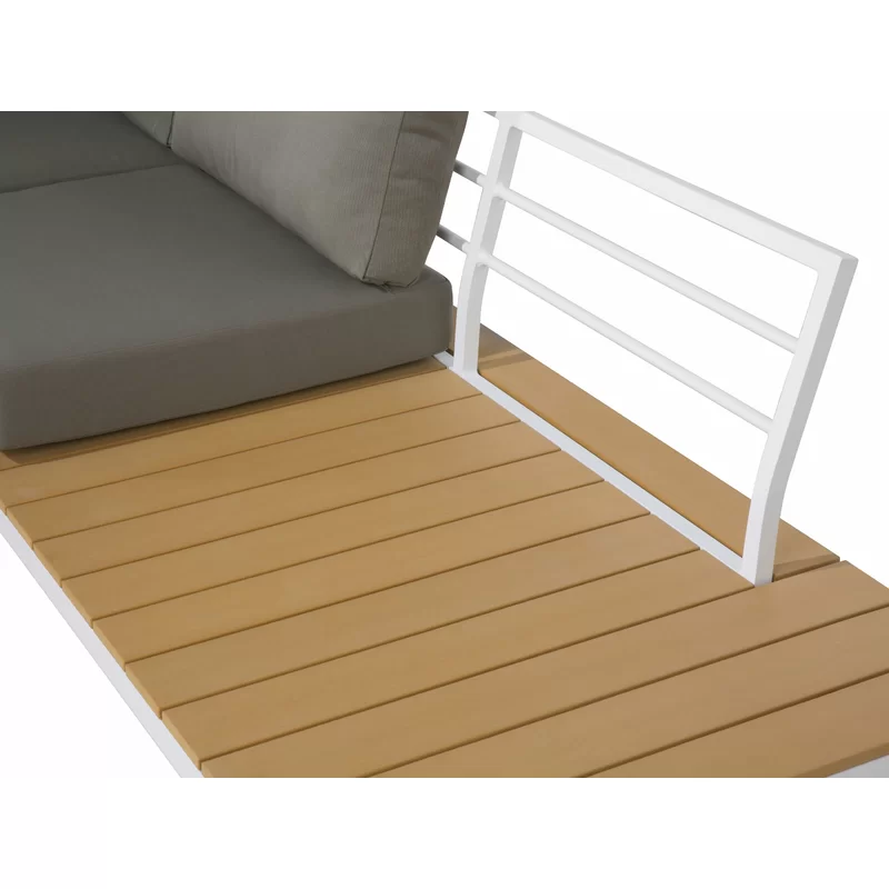 The complete garden furniture set showing sofa, chairs, and table.