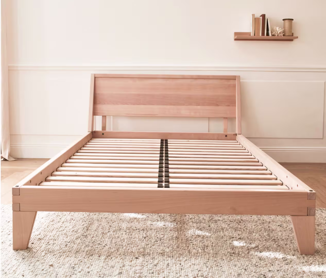 Modern wooden bed frame with central support leg