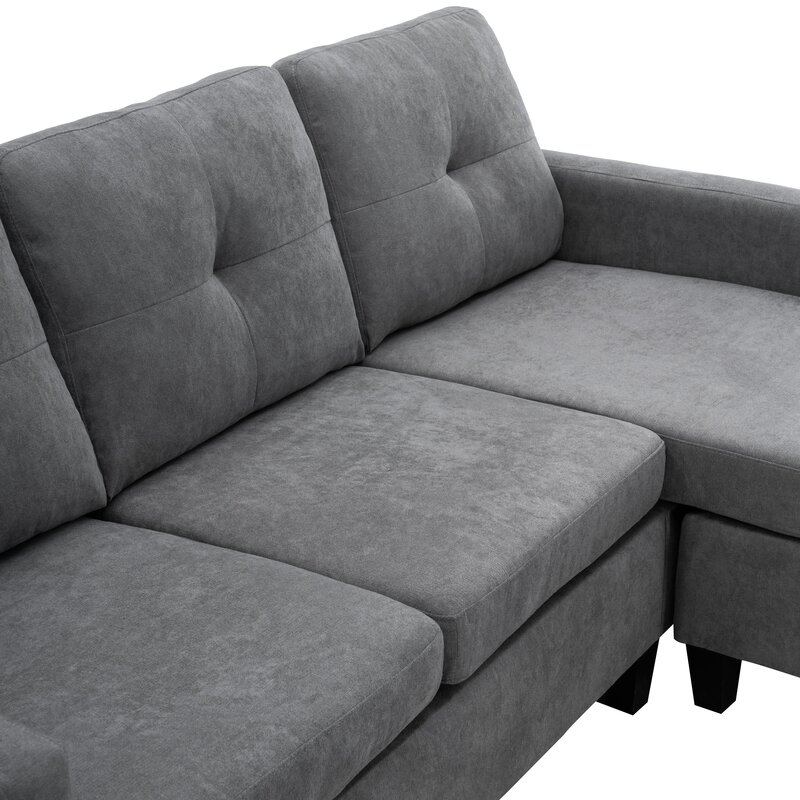 Close-up of the deep, plush cushions and upholstery texture on the sectional