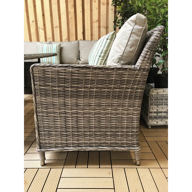 All-weather rattan sofa set arranged for outdoor entertaining