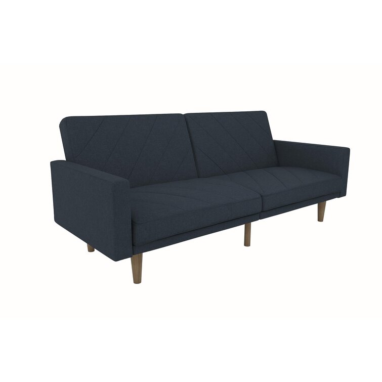 Modern living room featuring a large convertible sofa with split reclining feature.