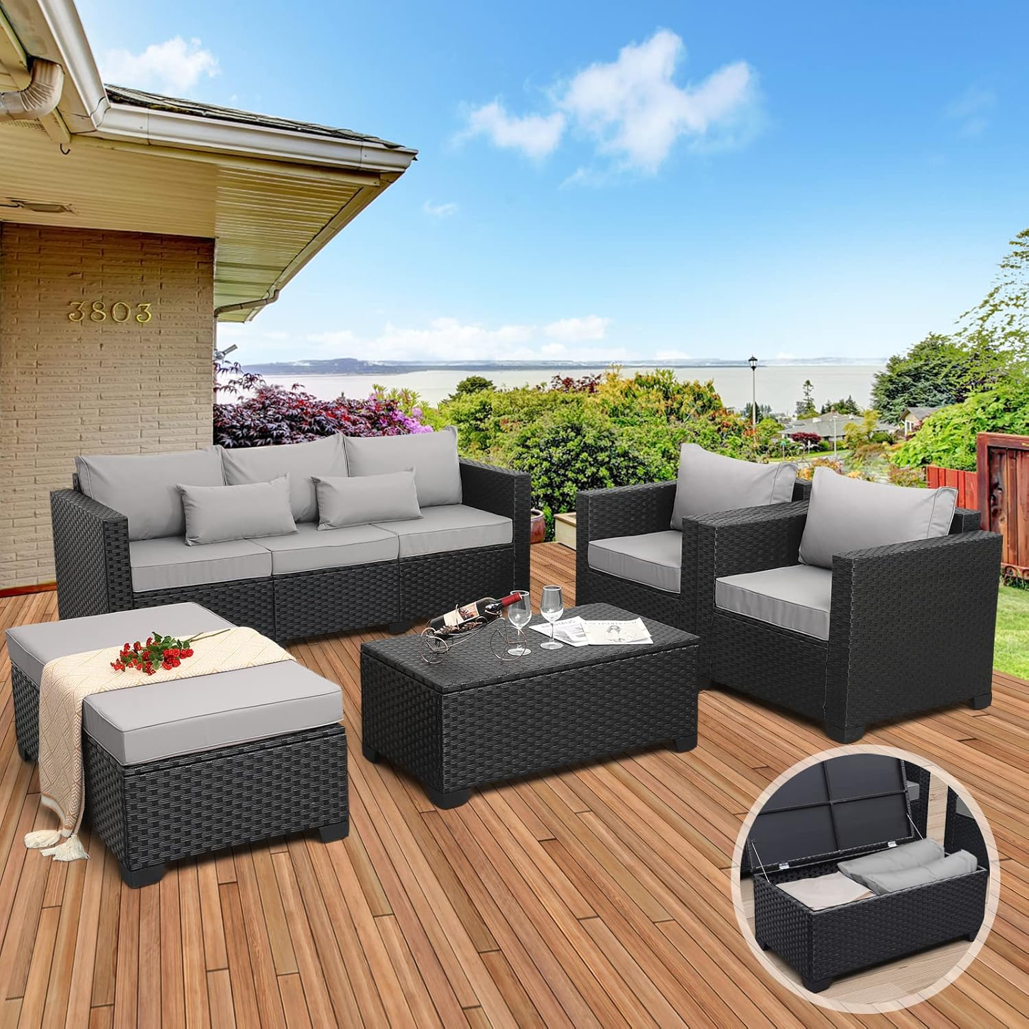 Peacock blue outdoor sofa and chair set arranged on a patio