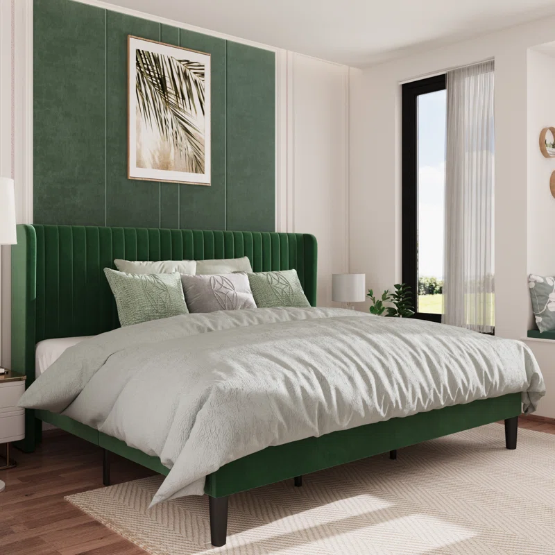 Bedroom bed with a button-tufted upholstered headboard.