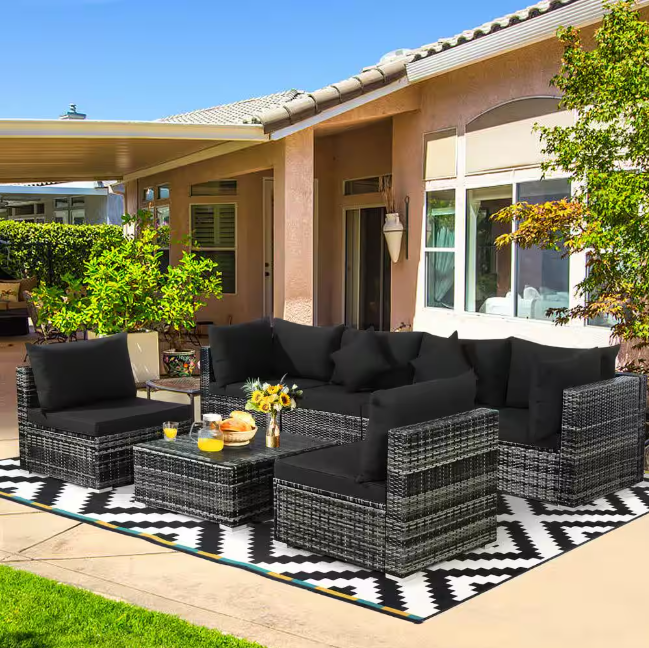 Close-up of the durable all-weather PE rattan weaving on the sofa frame