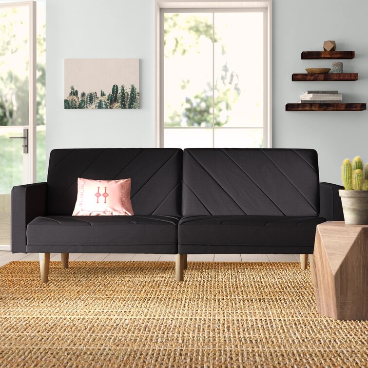 Spacious convertible sofa providing comfortable seating and sleeping arrangements.
