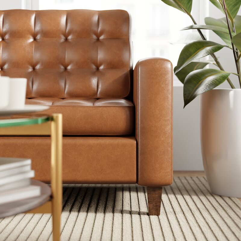 Modern living room sofa with clean lines and square arms