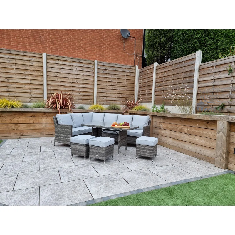 Spacious outdoor sectional with beige cushions on a deck