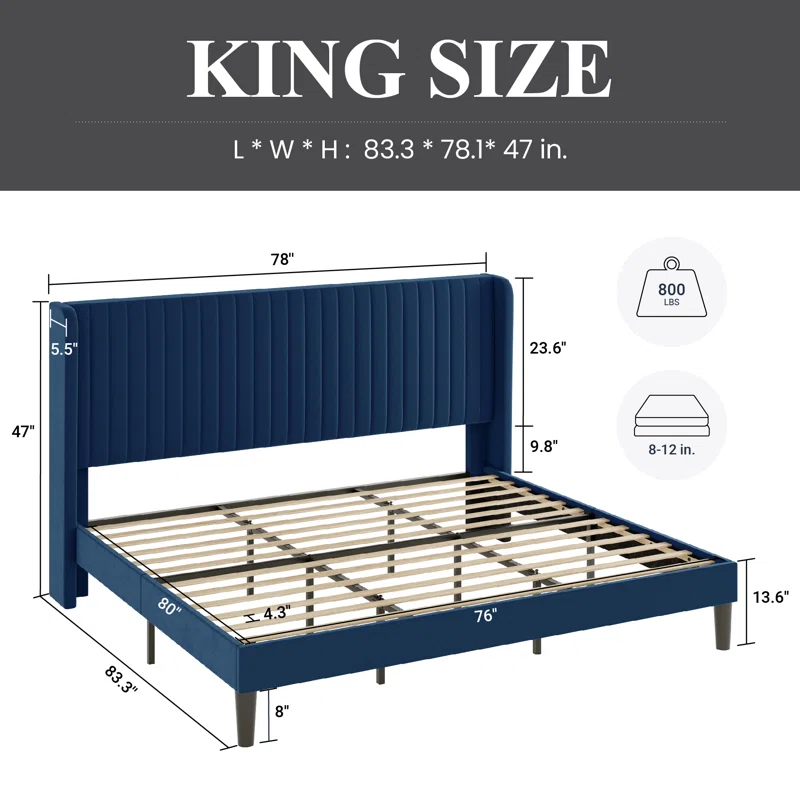Fabric bed with a sturdy wooden slat support system.