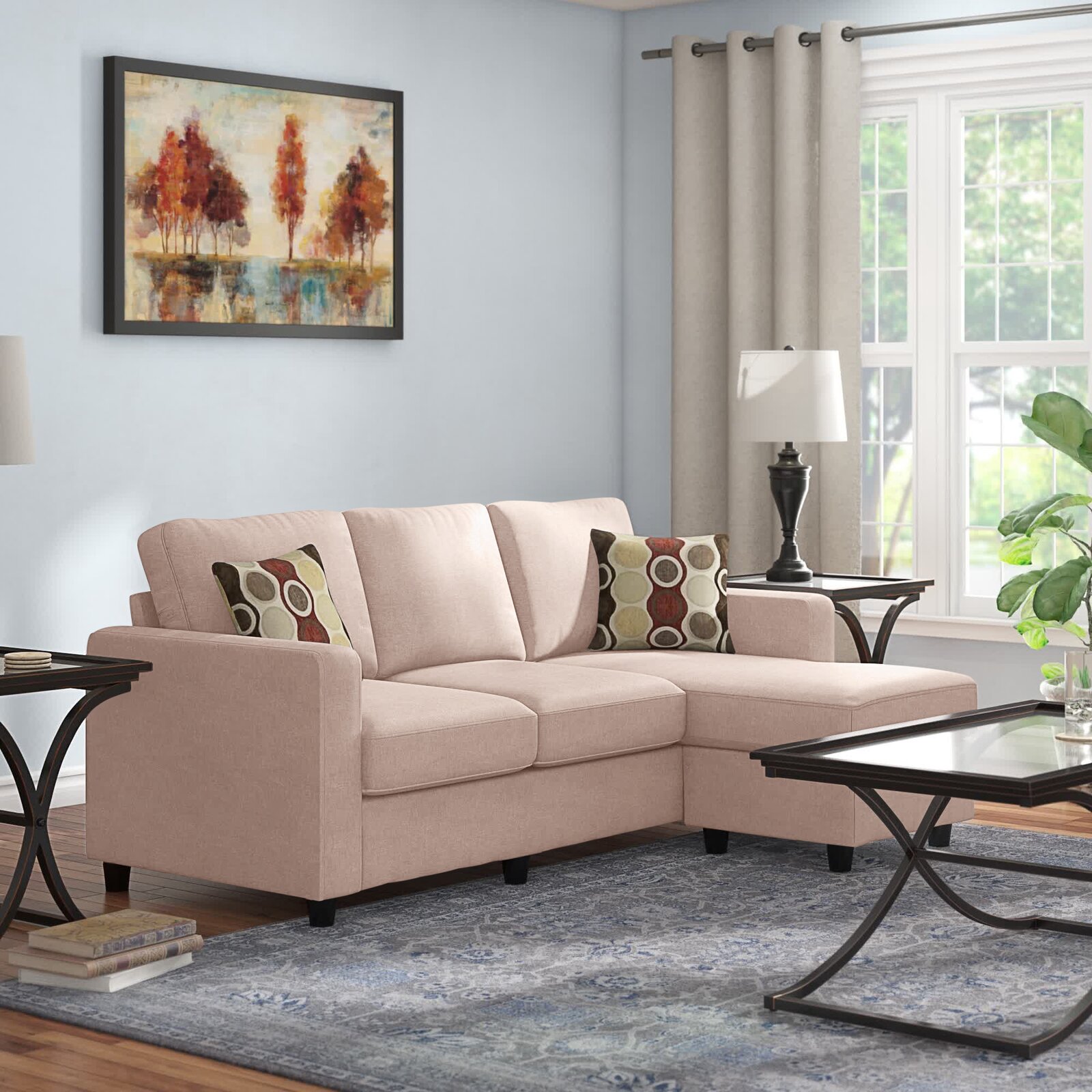Close-up view of the reversible sectional sofa's soft fabric upholstery and textured cushions.