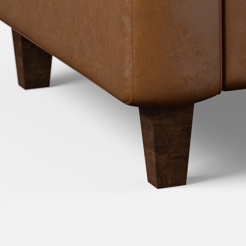 Durable faux leather sofa with deep comfortable seating