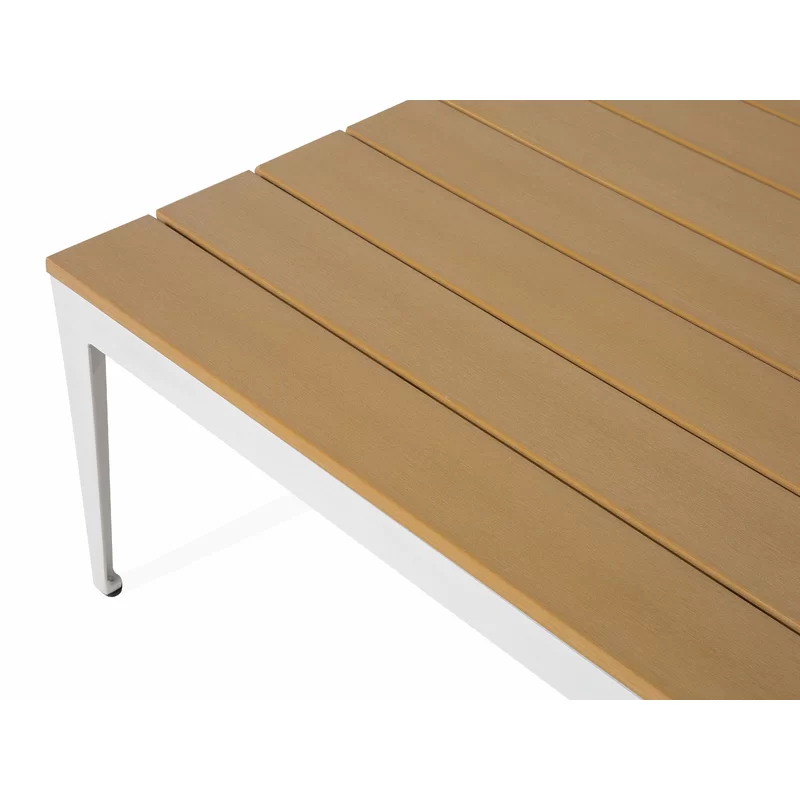 The matching center table with a glass top from the outdoor lounge set.