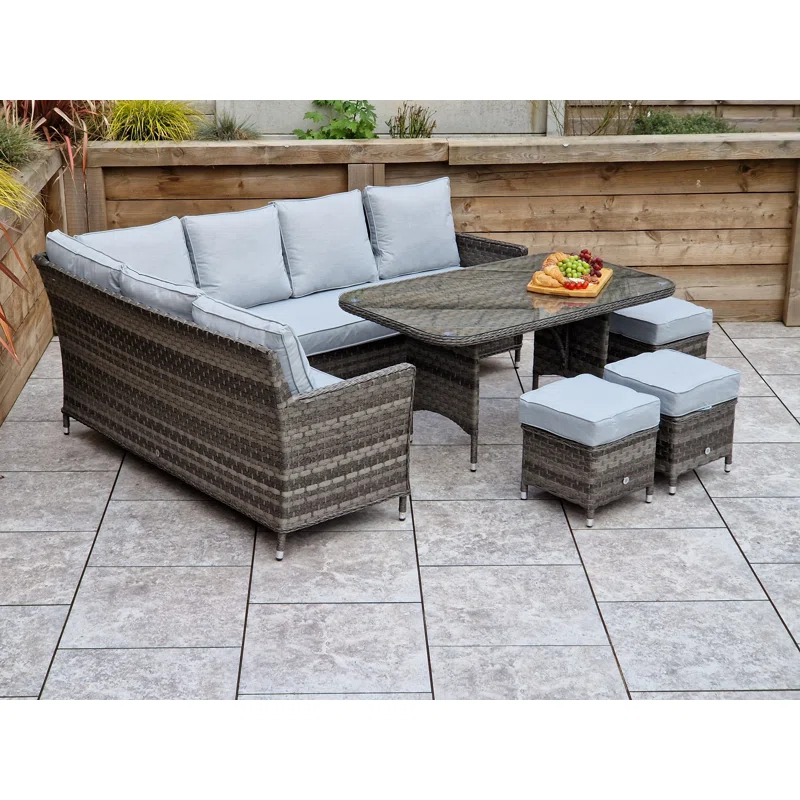 All-weather rattan sofa set arranged for outdoor entertaining