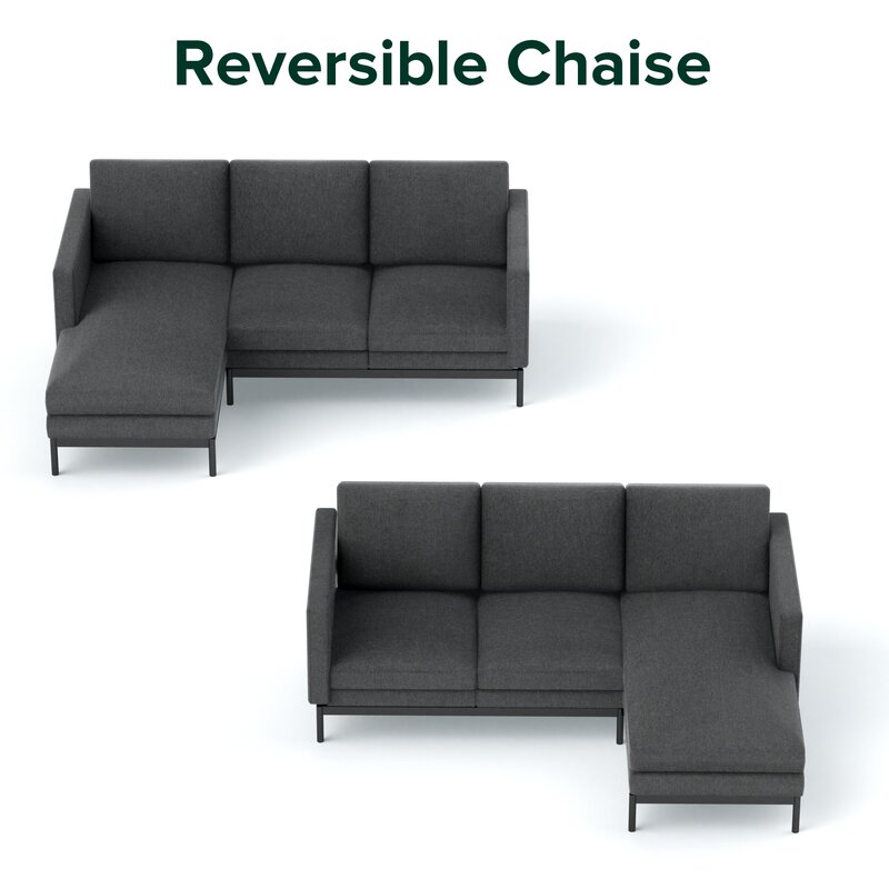Gray reversible sectional sofa with chaise positioned in a cozy family room.