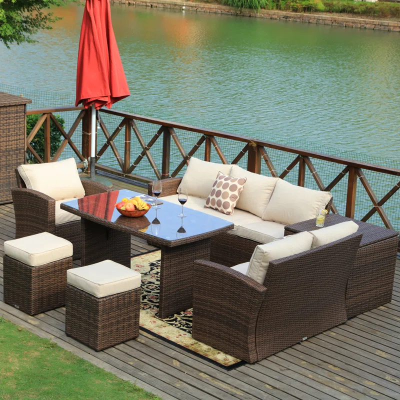 Outdoor wicker patio lounge set with cushions for eight people