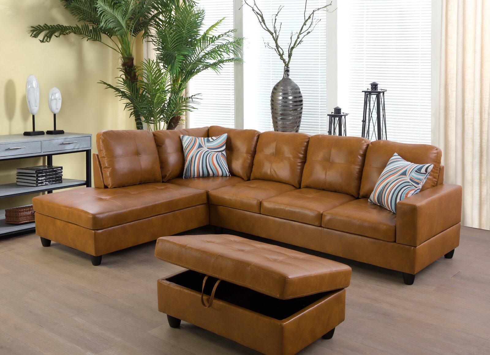 Comfortable reclining sofa set with chaise and footrest.