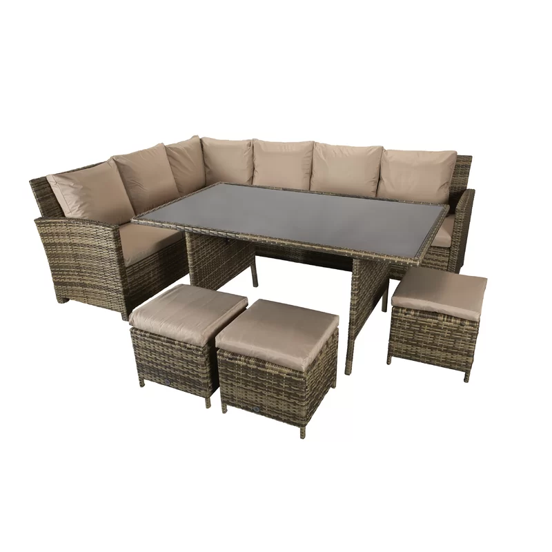 The patio lounge set fully arranged with plush cushions on a deck.
